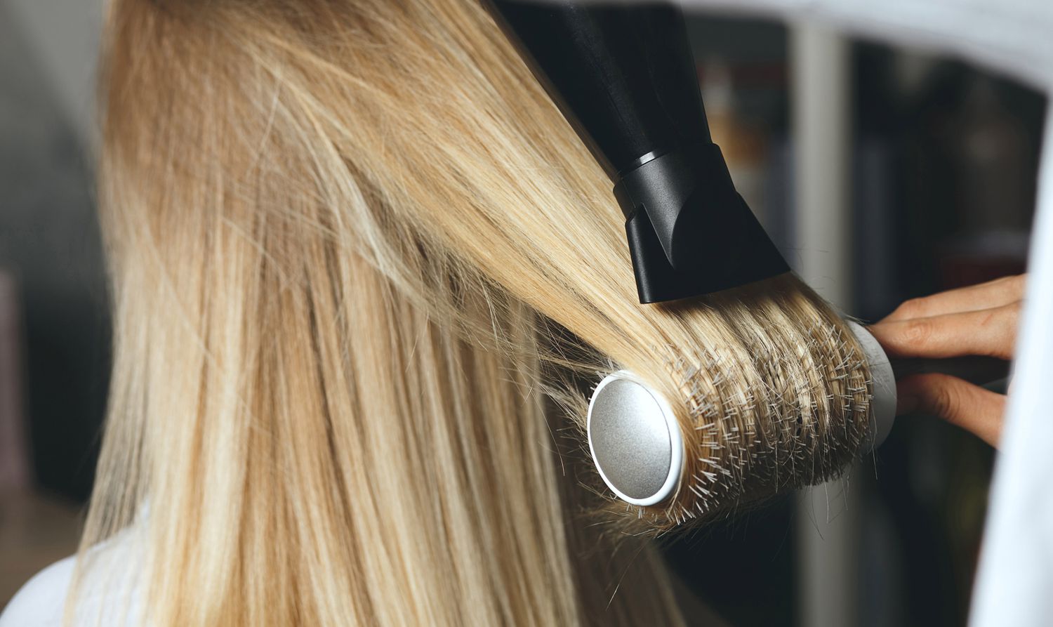 blow hair with round comb